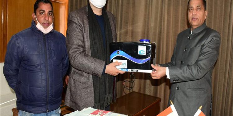 E-Tech Services presents touch free hand sanitizer machines to CM