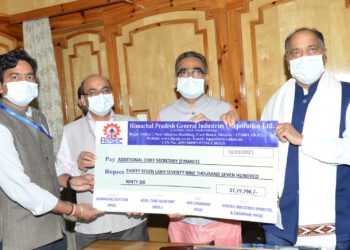 Industries Minister Presents Cheques to Chief Minister