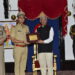 Governor honours ‘Harmony of the Pines’ Police Orchestra with Prernastrot Puraskarar