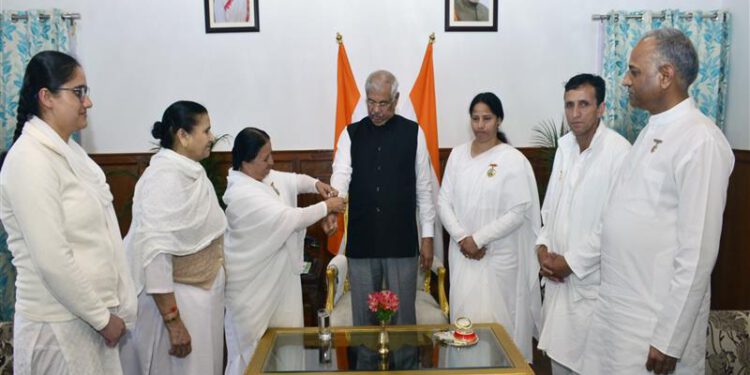 Brahma Kumaris tie Rakhi on wrist of Governor