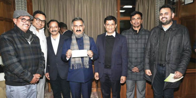 Cheque of Rs. three lakh towards Chief Minister Sukh-Ashray Sahayata Kosh